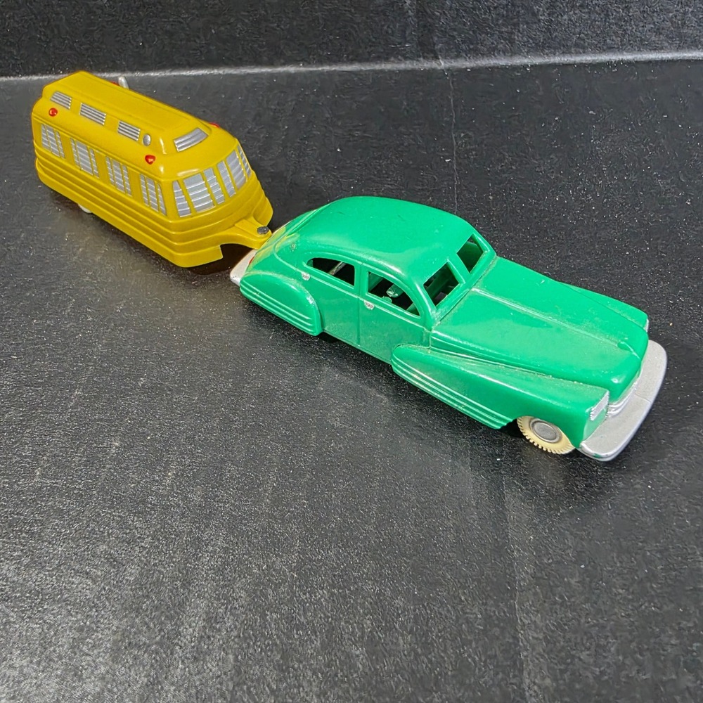 Binary Arts Collectors Dreams 2000 Green Sedan and Yellow Camper Trailer Set